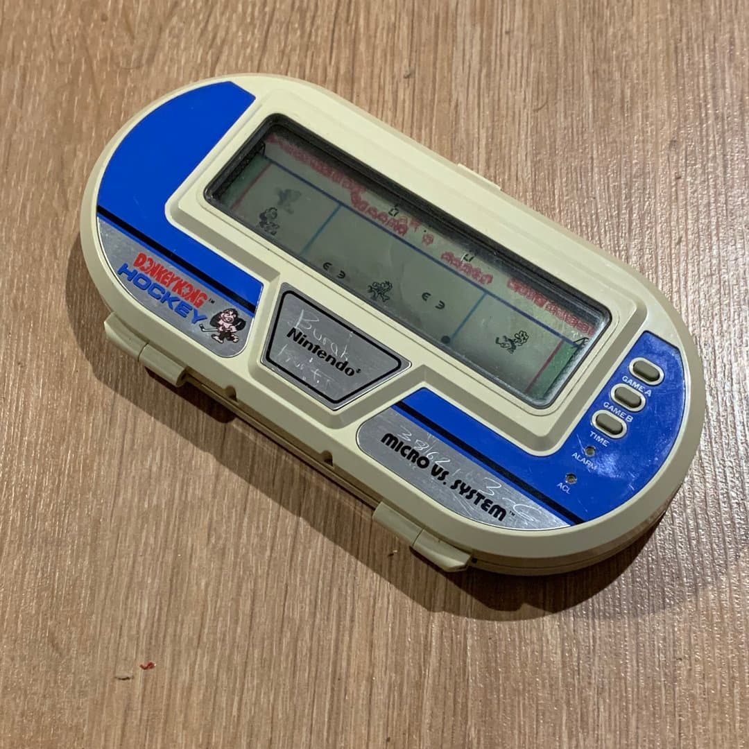 Nintendo Donkey Kong Hockey Micro Vs. System handheld game.