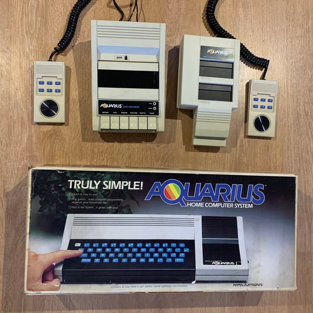 Mattel Aquarius Home Computer System with accessories and original box.