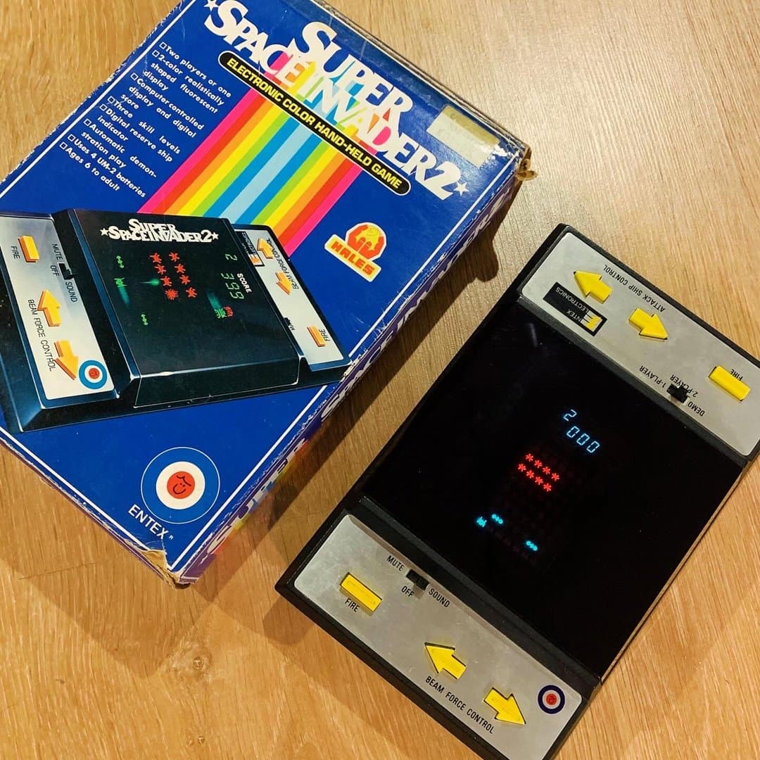 Vintage Entex Super Space Invader 2 handheld electronic game with box.