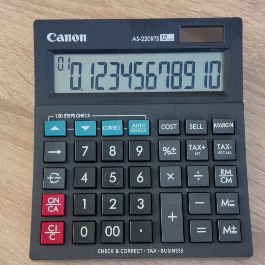 Canon AS-220RTS 12-digit calculator for business, tax, and general calculations.