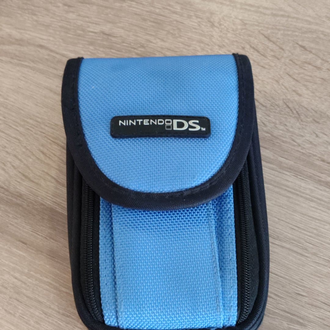 A blue Nintendo DS carrying case. Nintendo DS Lite