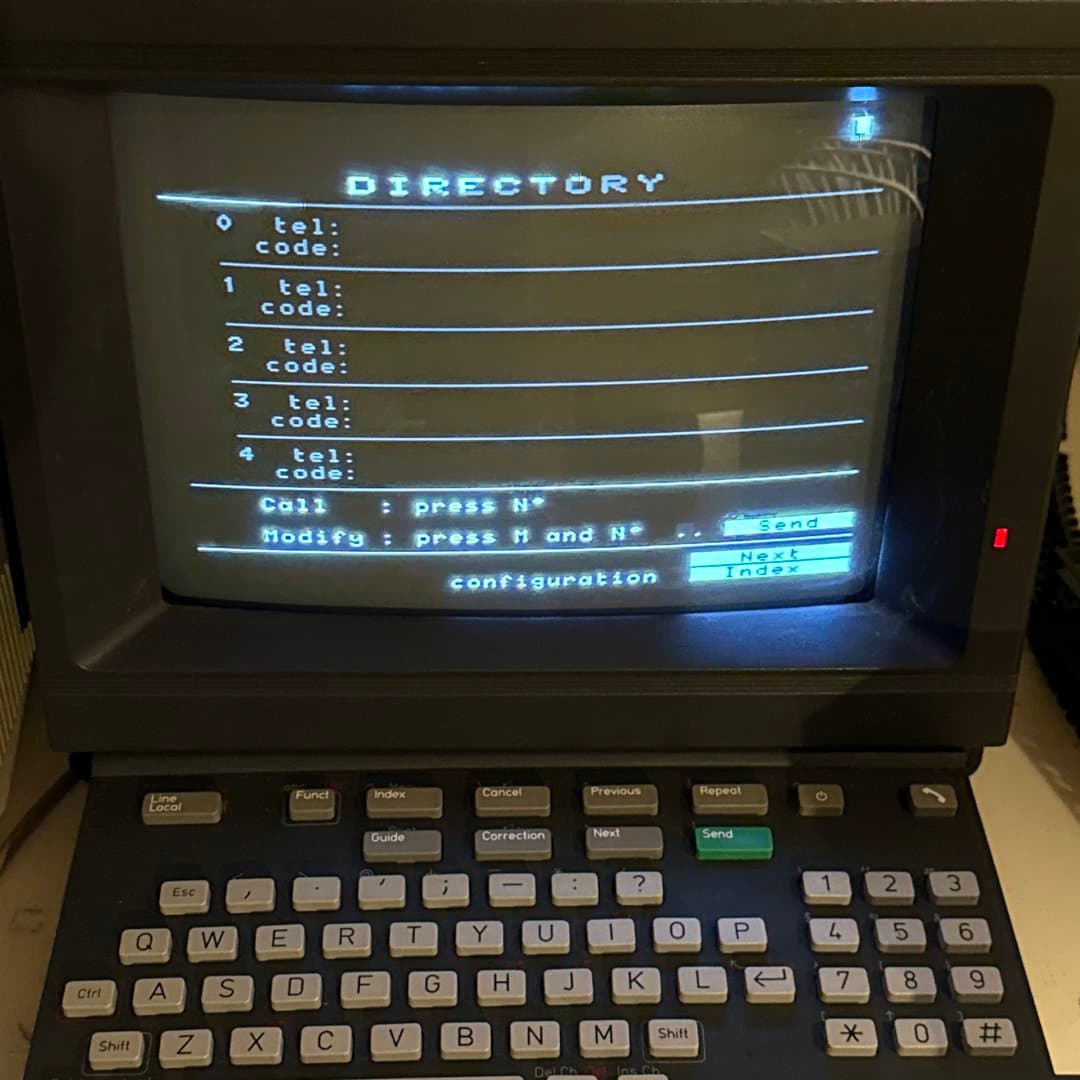 Vintage Philips telephone directory terminal with a built-in screen and keyboard.