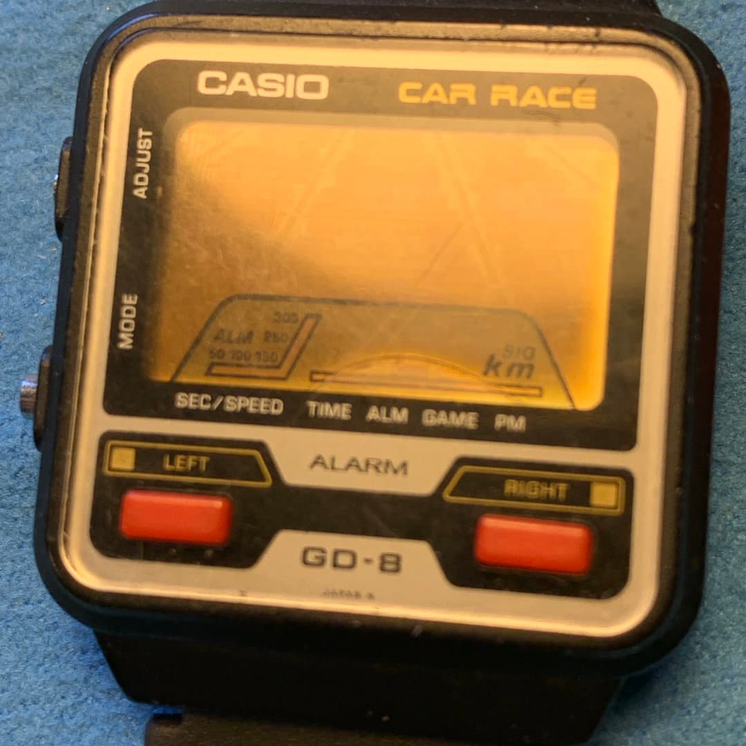 Vintage Casio GD-8 Car Race digital watch with a retro racing game display.