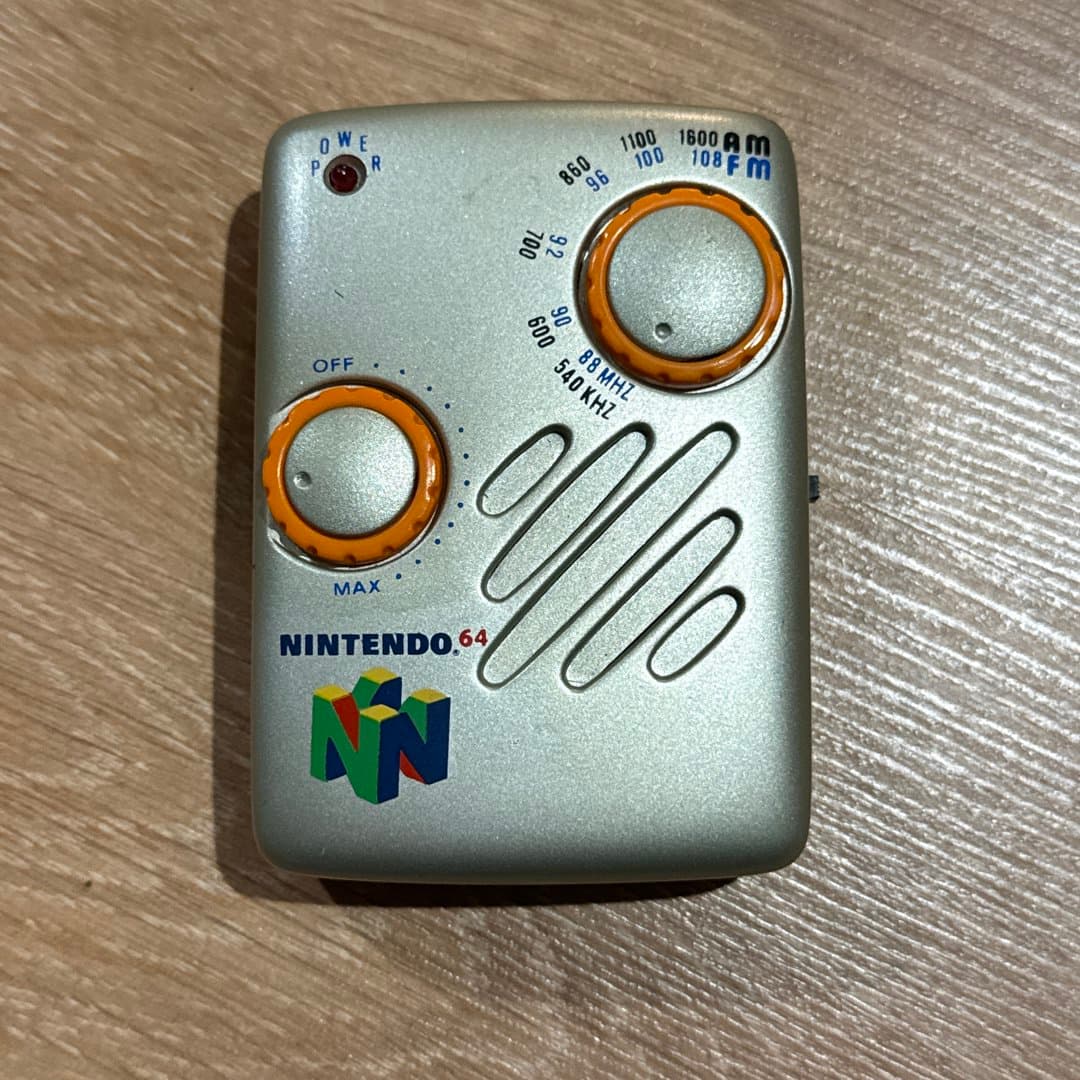A vintage Nintendo 64 branded AM/FM radio.