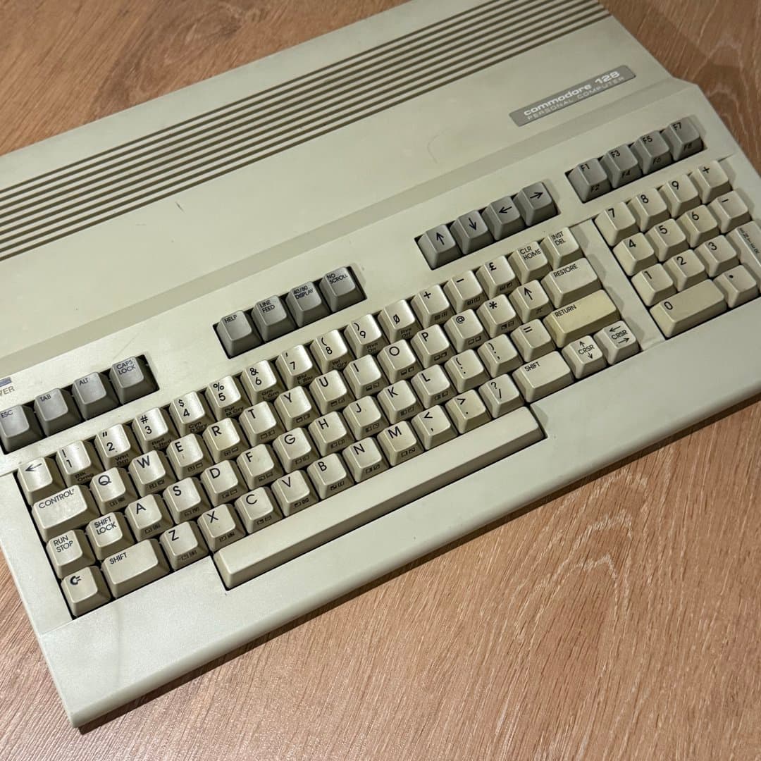 Commodore 128 personal computer, a classic 8-bit home computer from the 1980s. - Photo 1