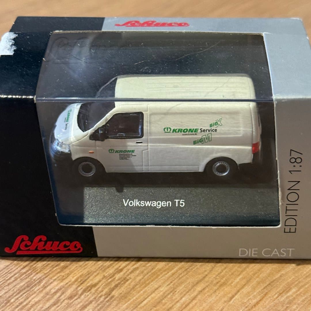 Schuco 1:87 scale die-cast model of a Volkswagen T5 van with Krone Service livery.