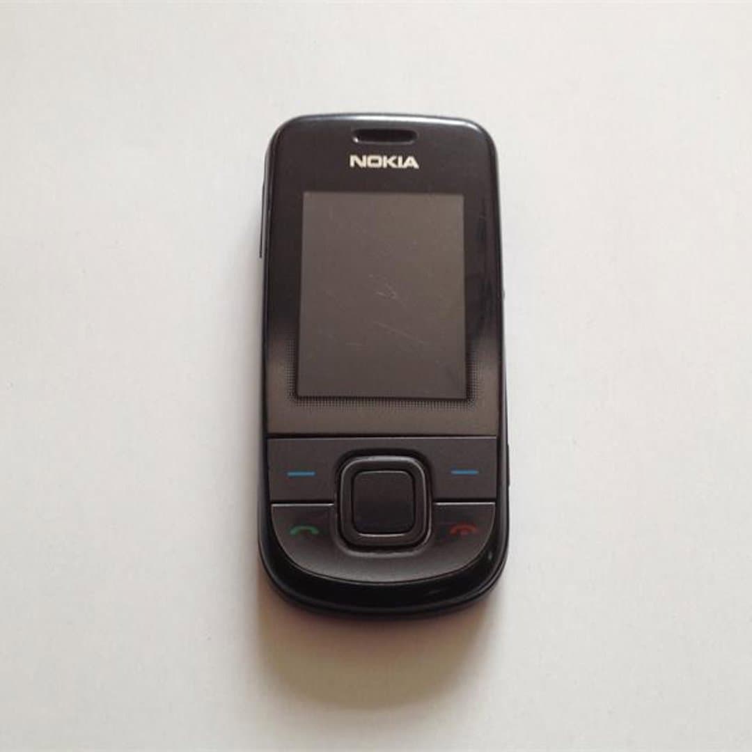 Nokia 3300s - Classic black Nokia mobile phone, a retro feature phone with physical controls. - Photo 1