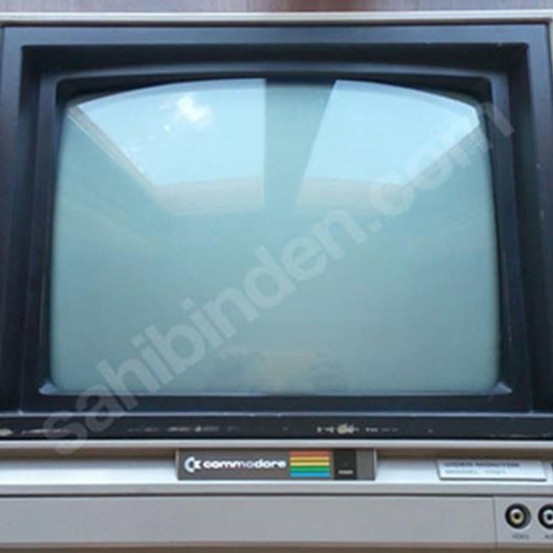 Vintage Commodore 1701 CRT video monitor, perfect for retro computing setups. - Photo 1
