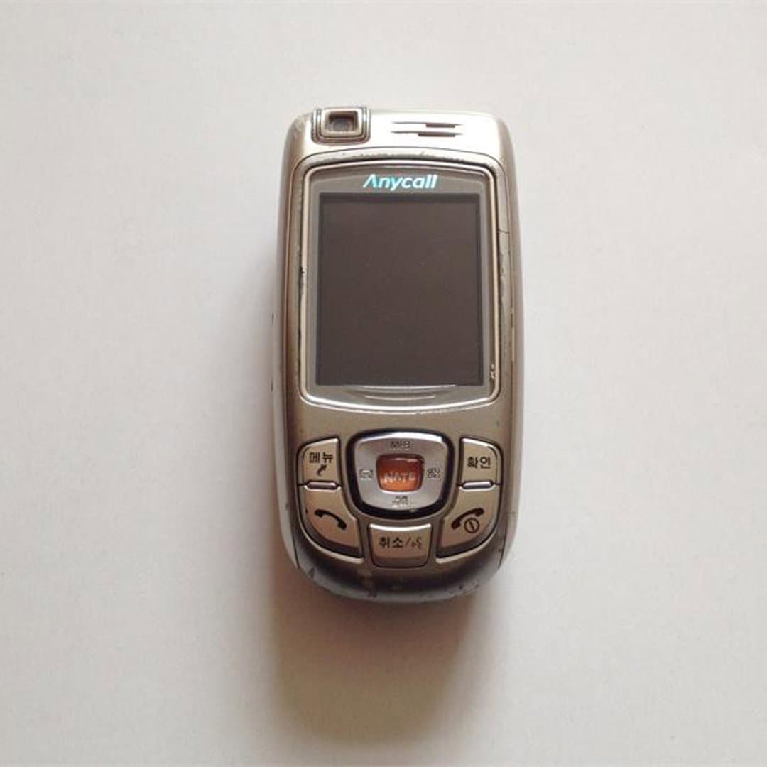 Samsung SGH-S140 - RetroAnycalll mobile phone, a nostalgic piece of early 2000s tech.