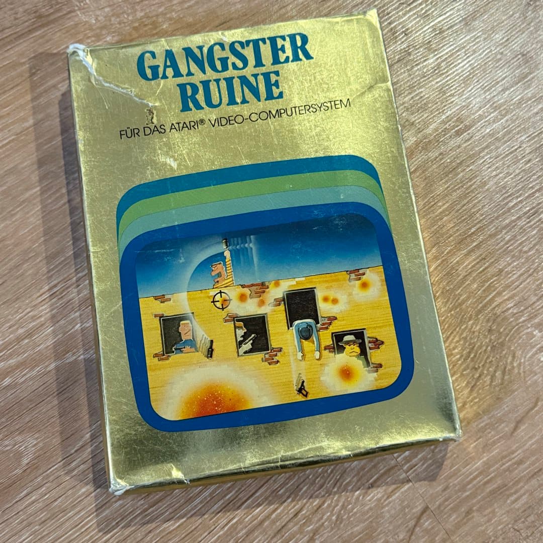 Vintage Atari 2600 game "Gangster Ruine" in its original box, a classic action title. - Photo 1