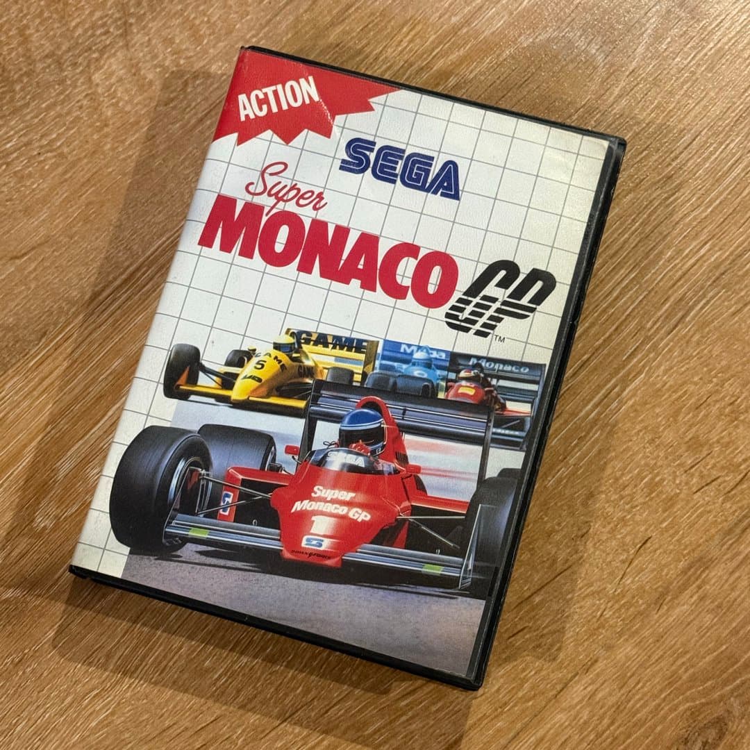 Classic Sega racing game, Super Monaco GP, featuring Formula 1 action on a vintage console.