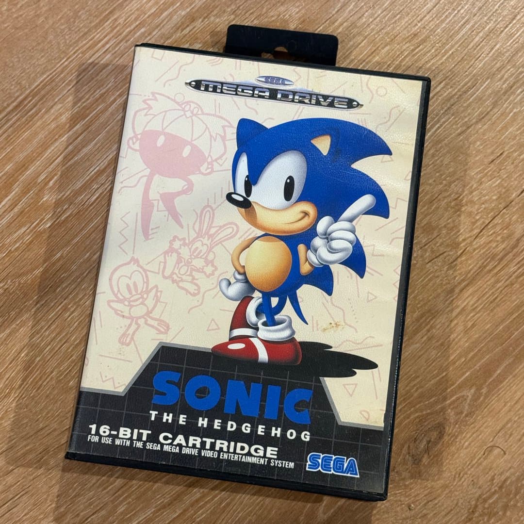 Classic Sega Mega Drive 16-bit cartridge for Sonic The Hedgehog.