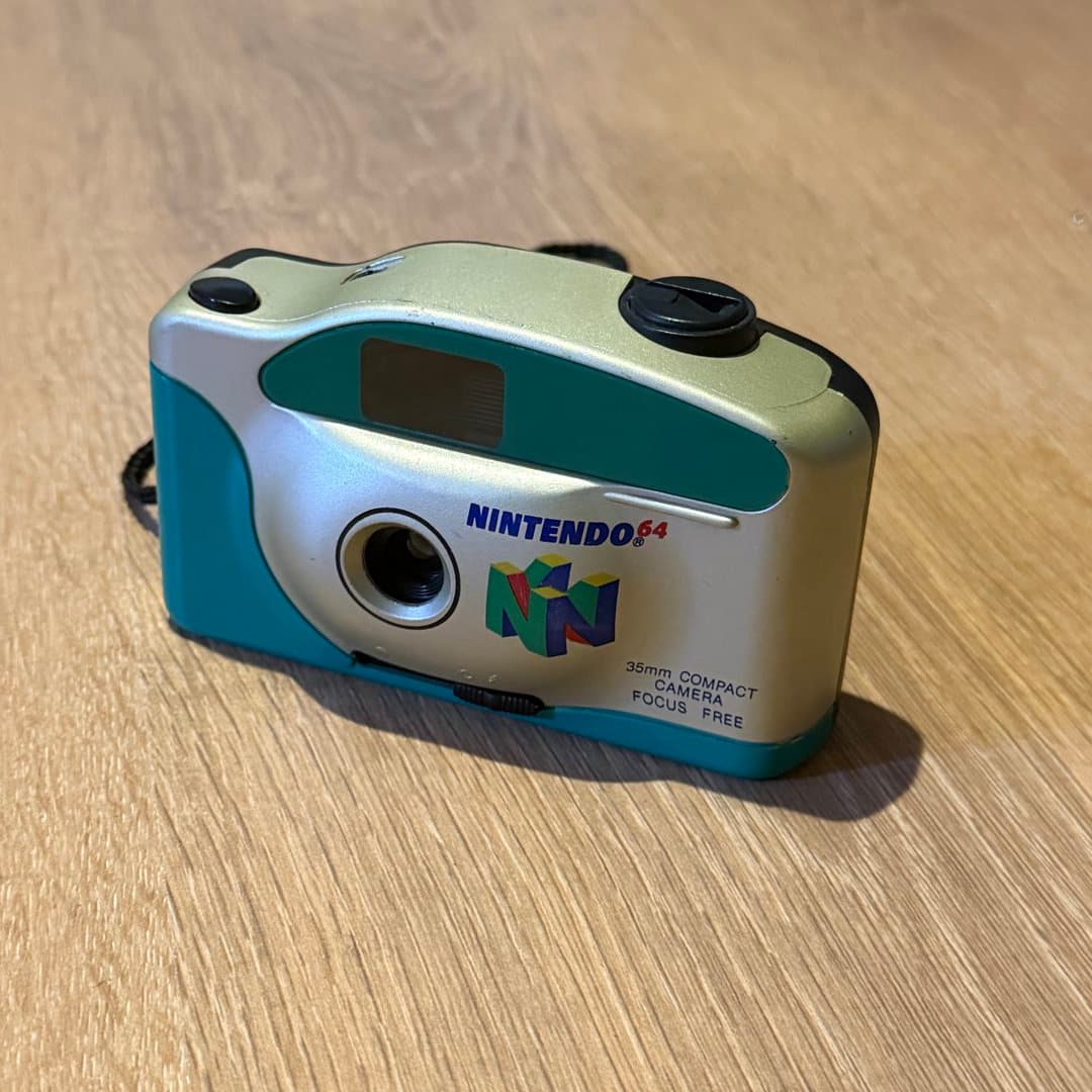 Retro Nintendo 64 branded 35mm compact film camera, focus-free. - Photo 1