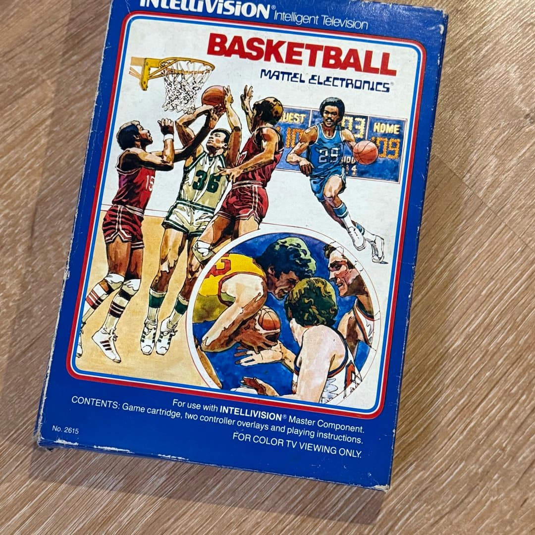 A vintage Intellivision Basketball game cartridge by Mattel Electronics, a classic retro sports game.