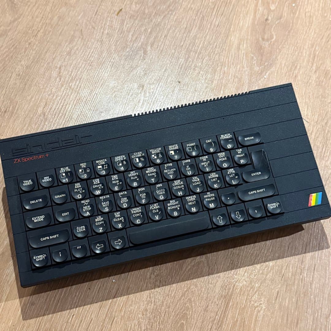 A vintage Sinclair ZX Spectrum+ 8-bit home computer, known for its unique keyboard. - Photo 1