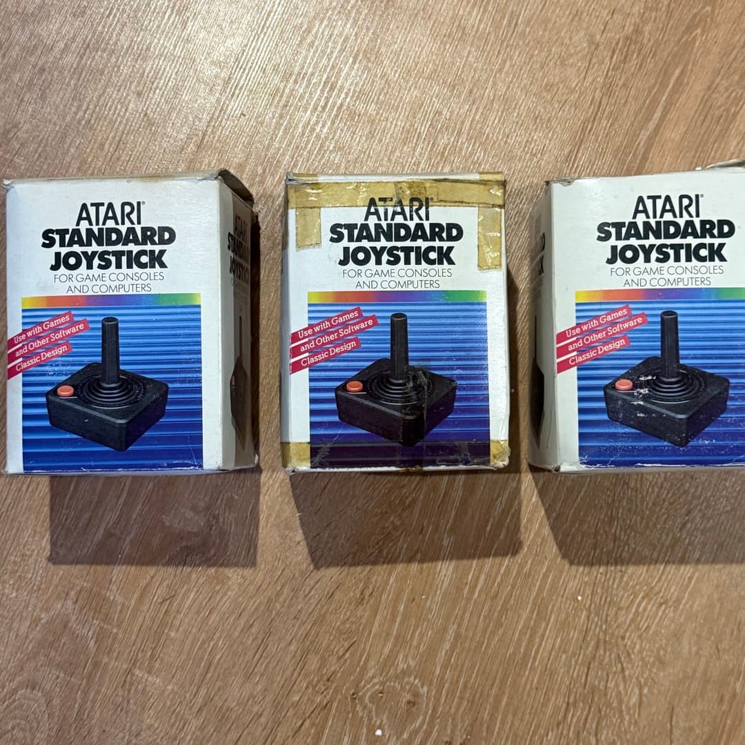 Vintage Atari Standard Joysticks for game consoles and computers, classic design.