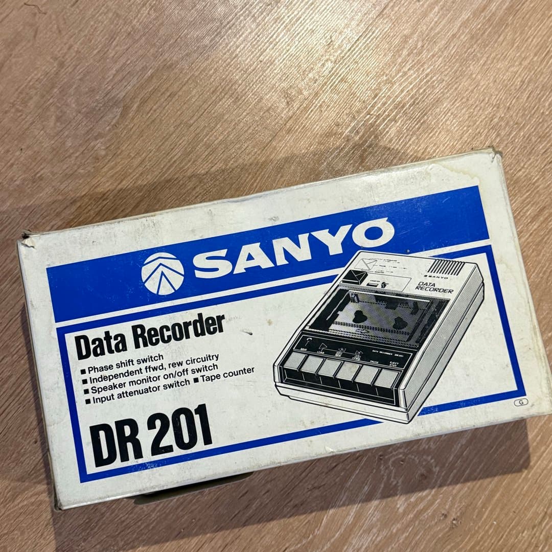 Sanyo DR 201 vintage data recorder for cassette tapes, featuring various control switches.