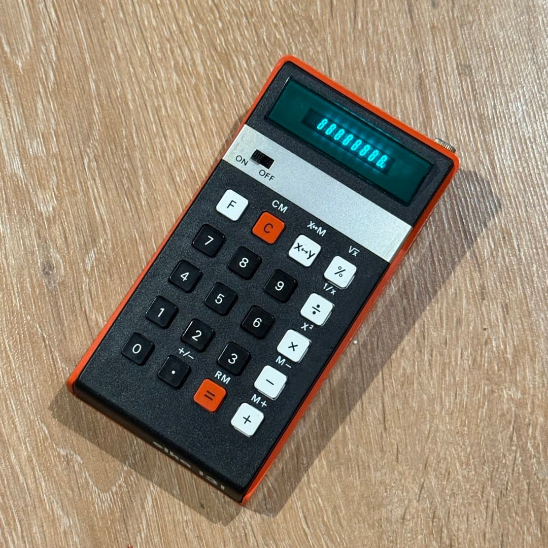Vintage orange Elka 131 electronic calculator, made in Bulgaria by ISOTIMPEX.