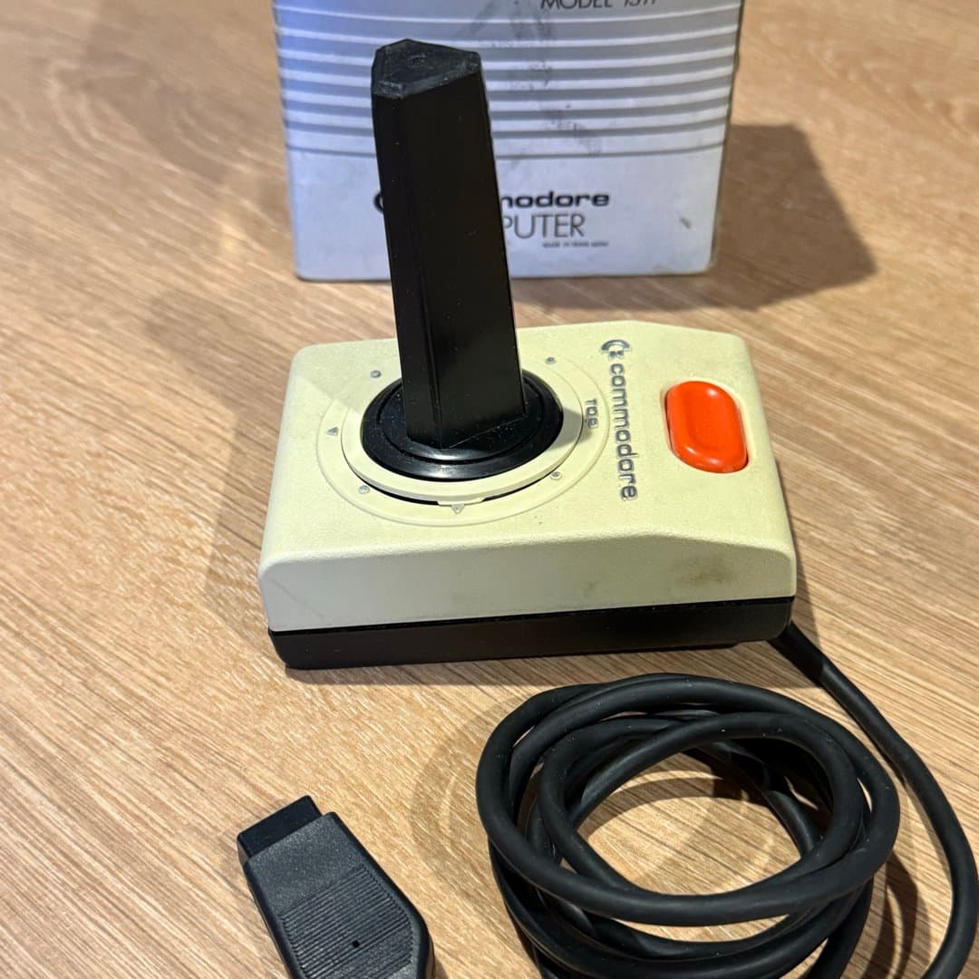 Vintage Commodore 1311 joystick for classic computer gaming.