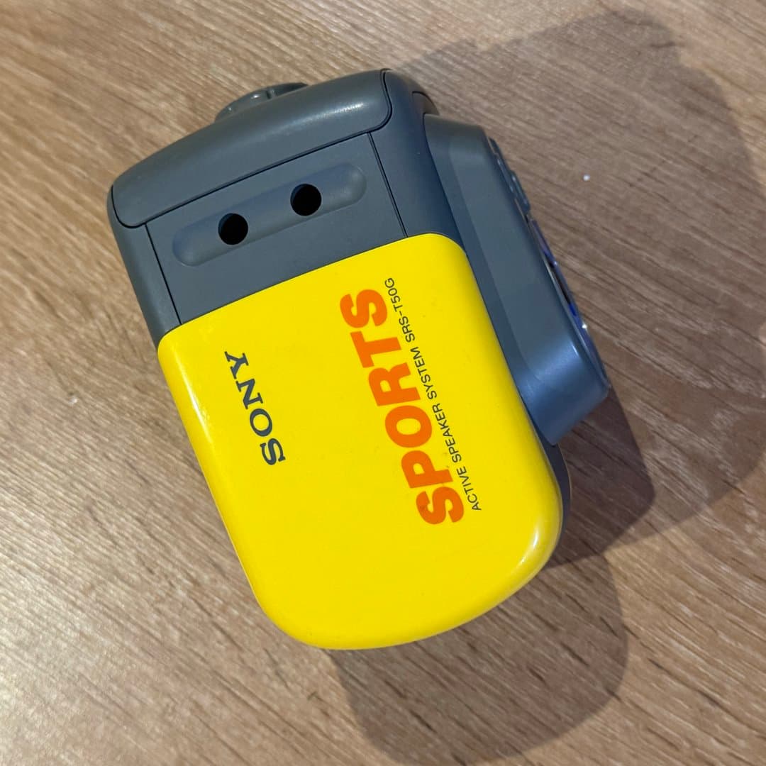 Vintage Sony Sports active speaker system SRS-T50G in yellow and grey.