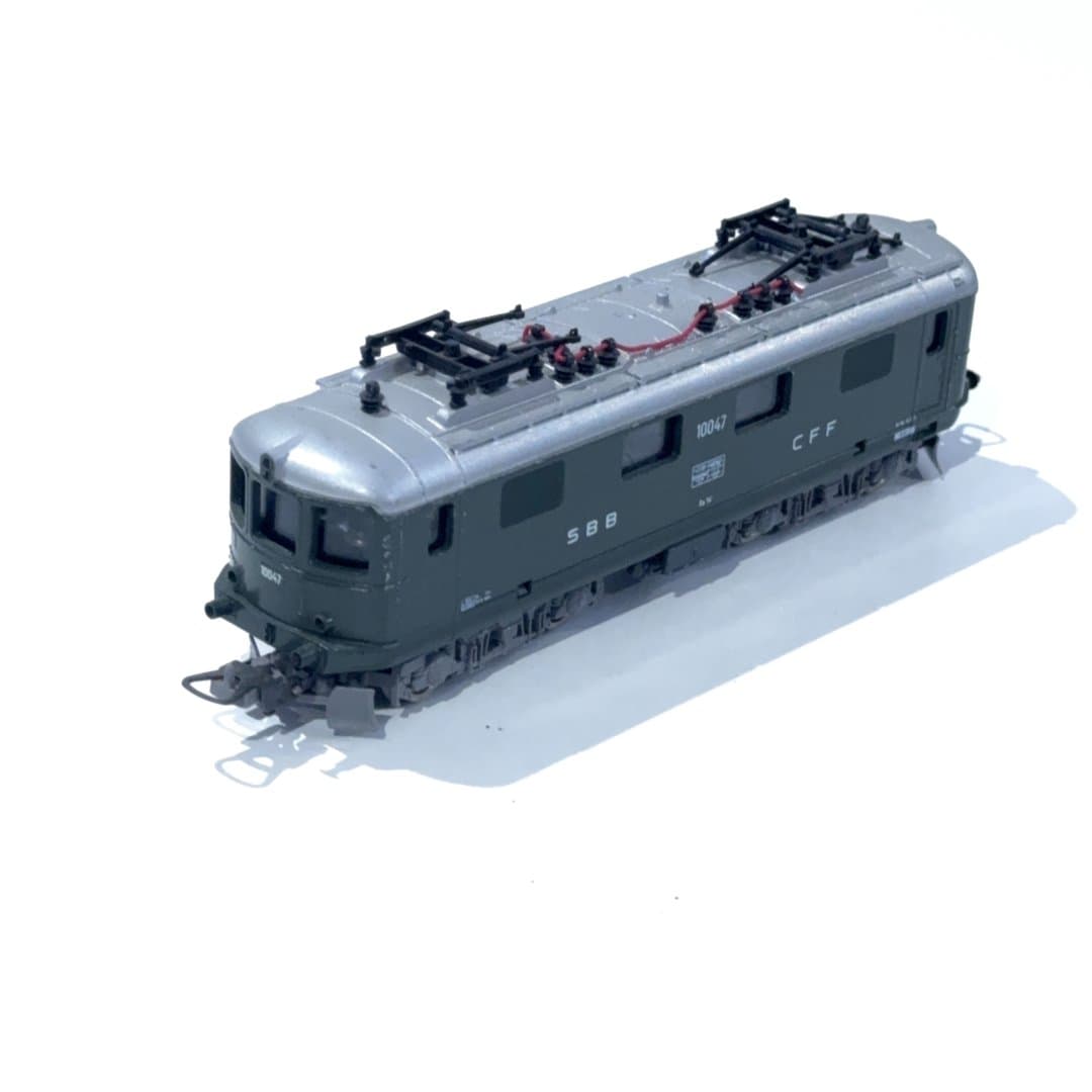 Detailed model of a green Lima SBB CFF electric locomotive.