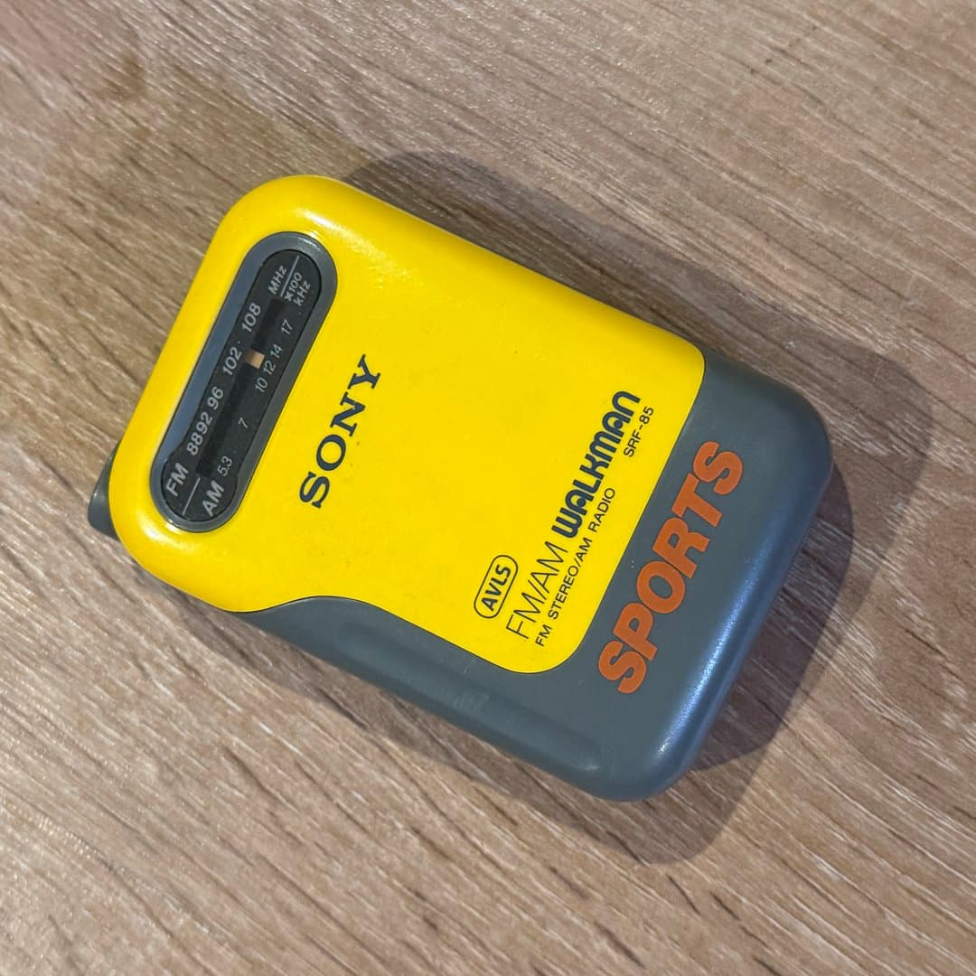 Vintage Sony Sports Walkman SRF-85 FM/AM radio, a classic portable audio device.