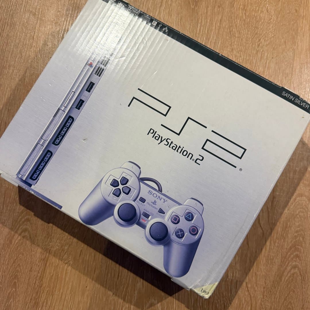 Original box for a Sony PlayStation 2 (PS2) Satin Silver edition console.