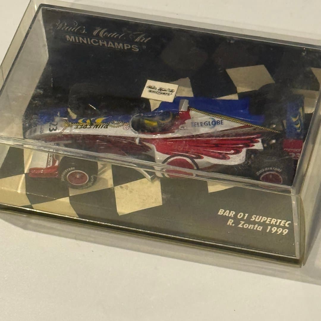 Minichamps BAR 01 Supertec R. Zonta 1999 Formula 1 die-cast model car in display case.