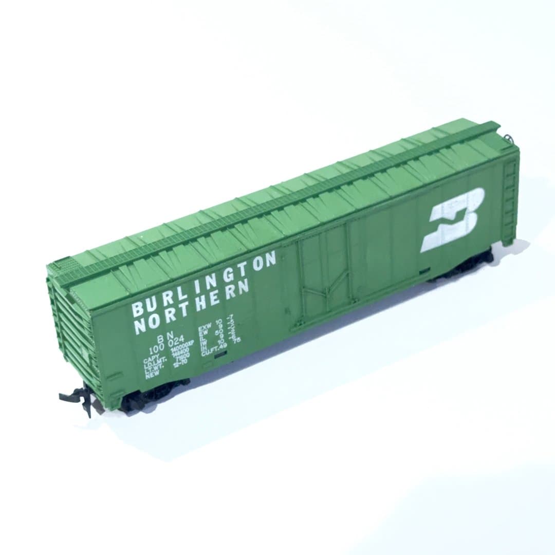 Green Burlington Northern model freight car for train enthusiasts. HO Scale