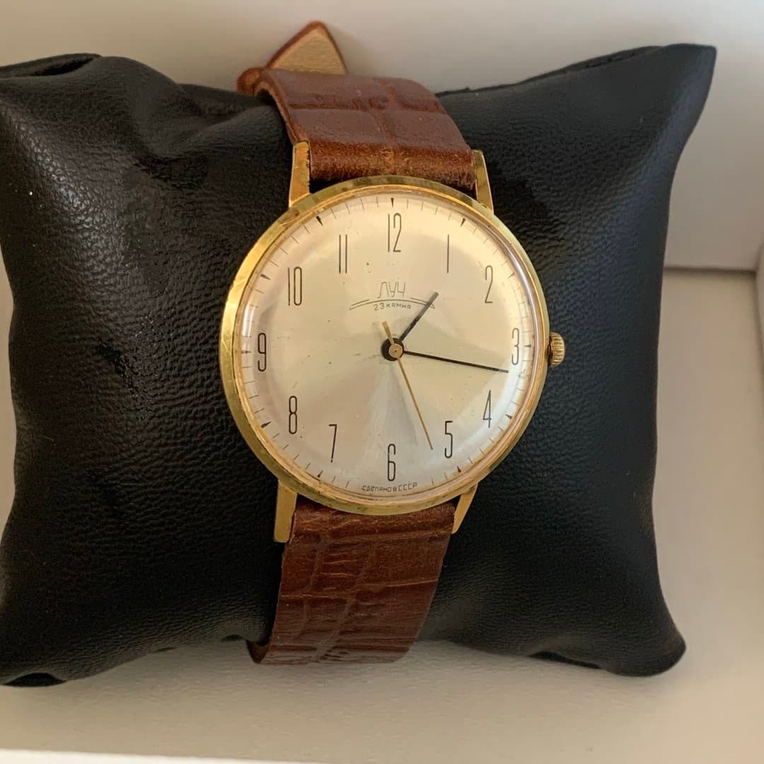 Vintage gold-tone Luch 23 jewels mechanical watch, Made in USSR, with brown leather strap.
