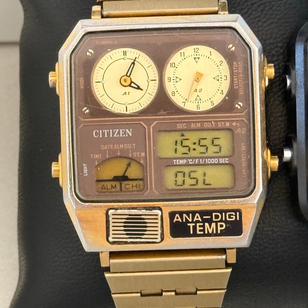 Vintage gold Citizen Ana-Digi Temp watch with dual analog and digital displays and thermometer.