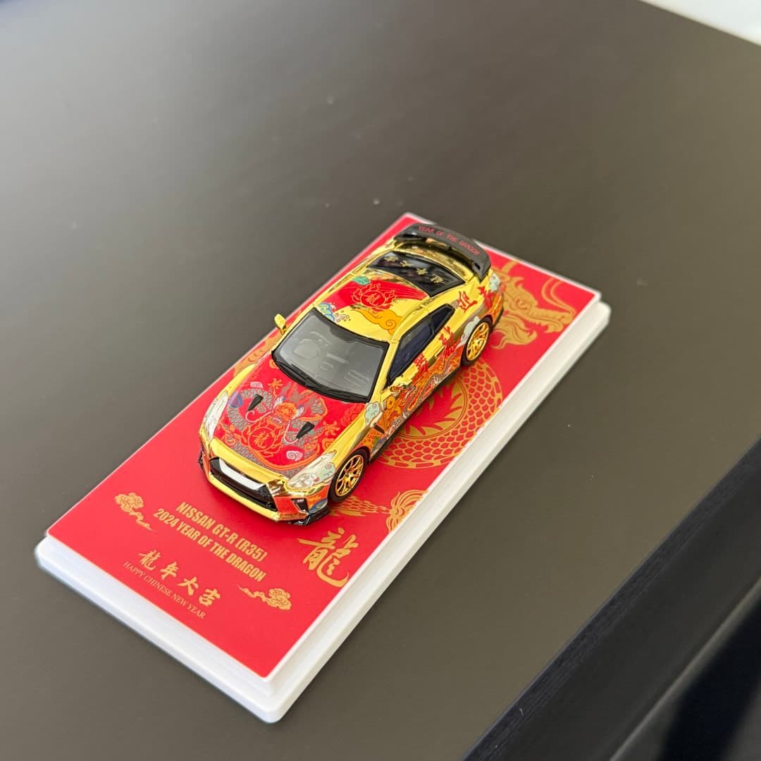 A Nissan GT-R (R35) model car, celebrating the 2024 Year of the Dragon.