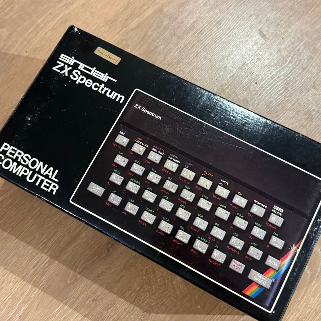 Vintage Sinclair ZX Spectrum personal computer in its original box, a classic 8-bit home computer.