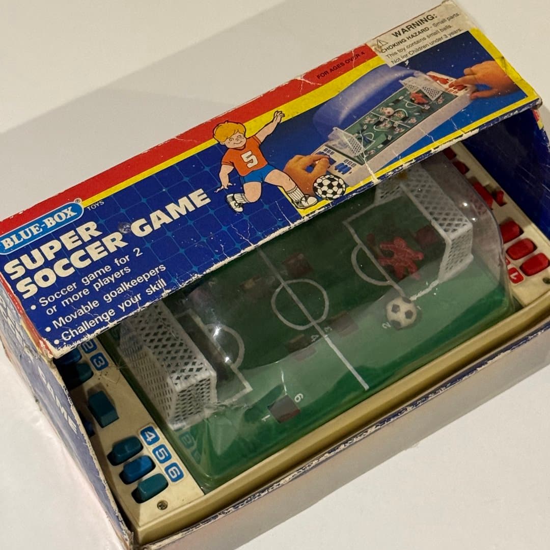 Retro Blue-Box Super Soccer Game, a classic tabletop football game.