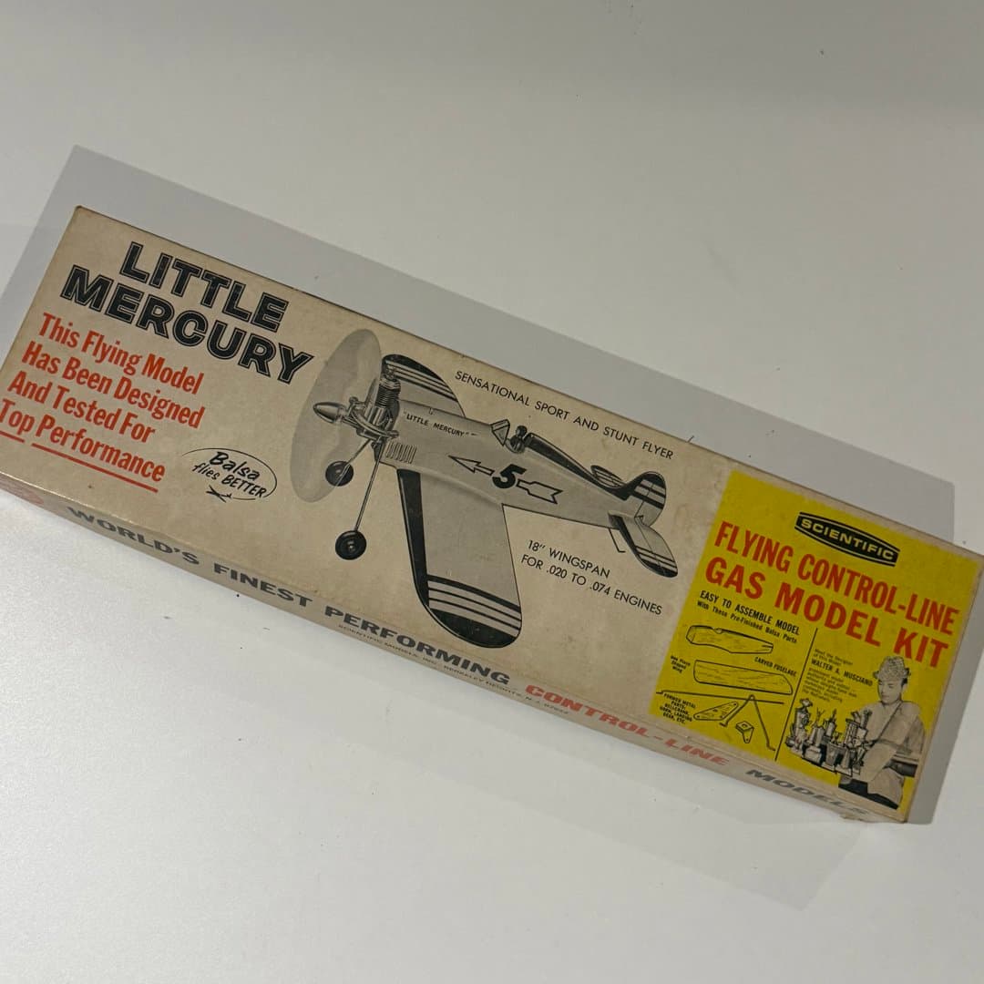 A vintage "Little Mercury" Scientific control-line gas model airplane kit for sport and stunt flying.
