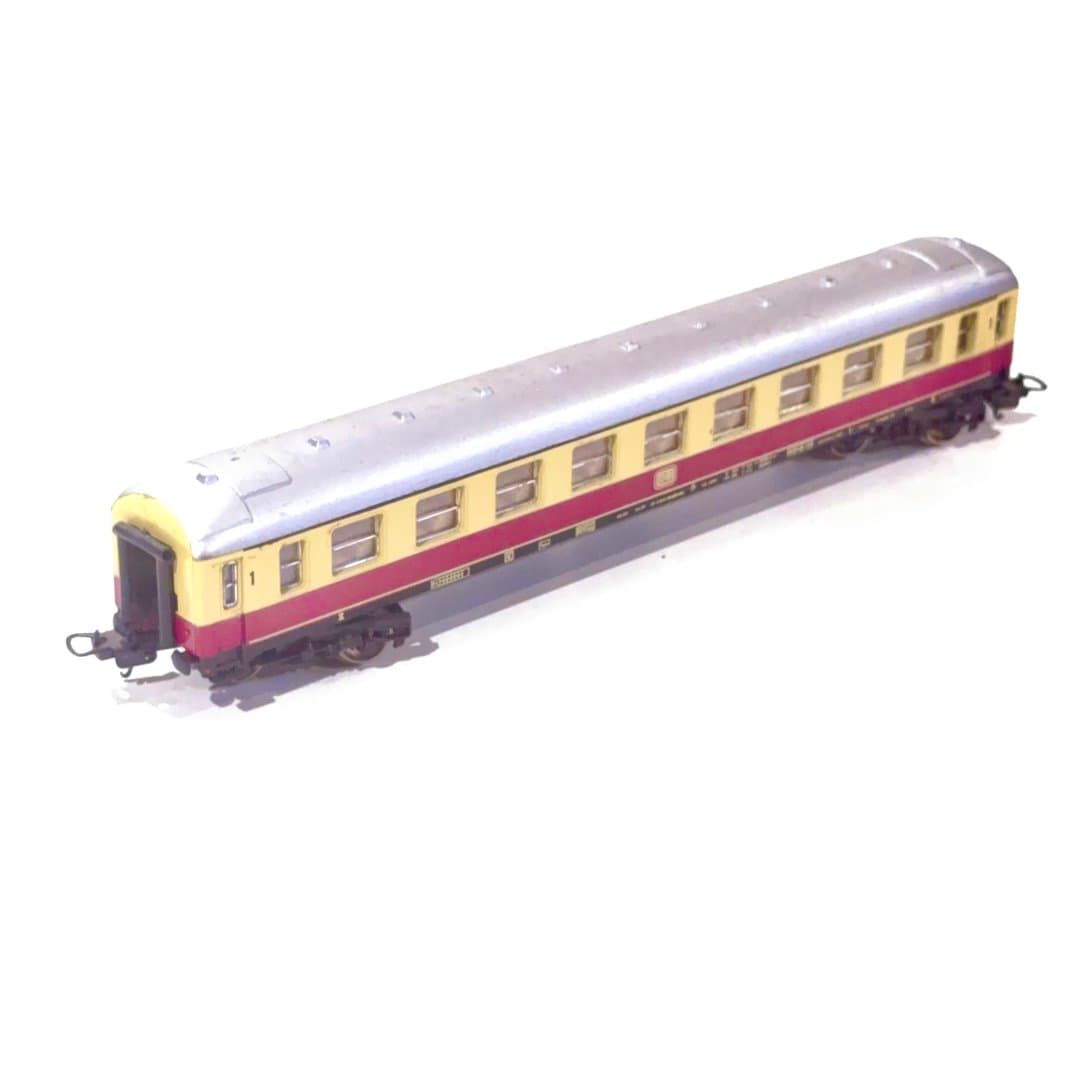Lima Detailed HO miniature railway coach with yellow and maroon livery, ideal for model train enthusiasts.