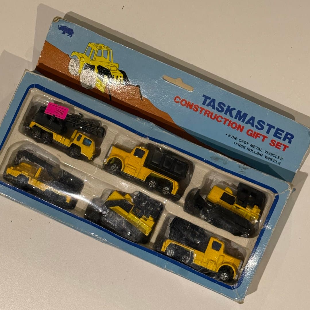 Taskmaster Construction Gift Set with 6 die-cast metal vehicles, free rolling wheels.