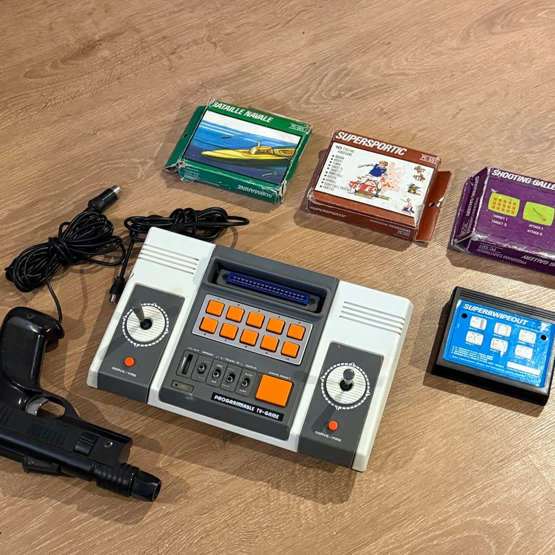 Vintage programmable TV game console with joysticks and cartridge slot. - Photo 1
