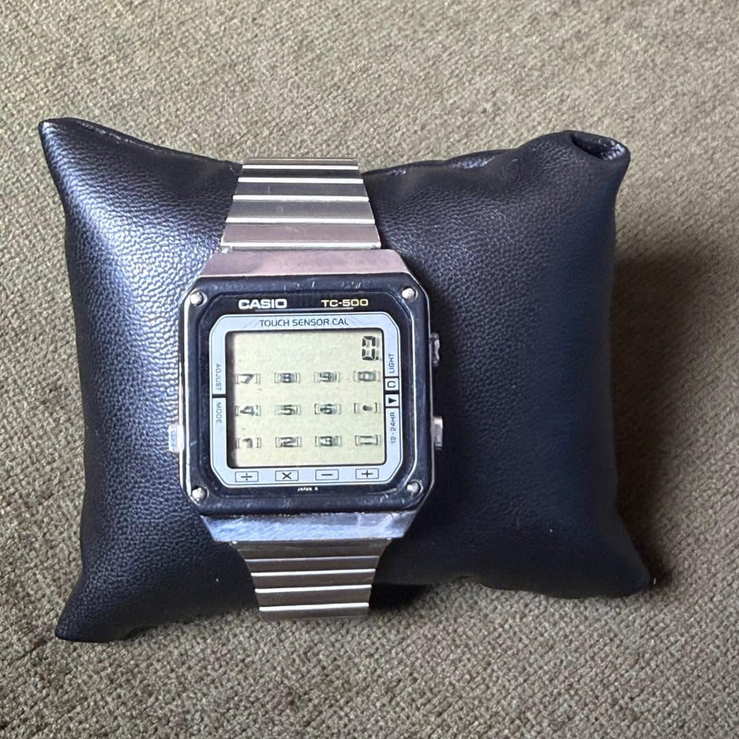 Casio TC-500 touch sensor digital watch with metal band.