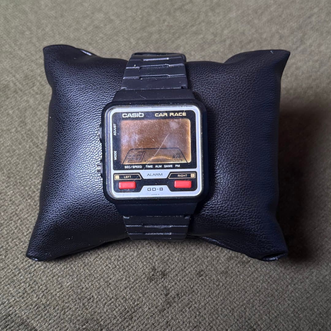 Casio GD-8 Car Race digital watch with a retro racing game display.