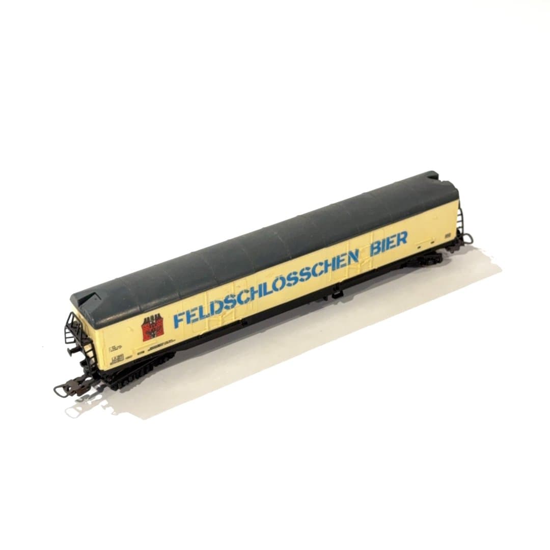 Lima Detailed model train beer wagon featuring 'Feldschlösschen Bier' branding, ideal for collectors.