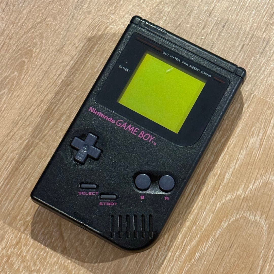 Classic black Nintendo Game Boy handheld console, a retro gaming icon. - Photo 1