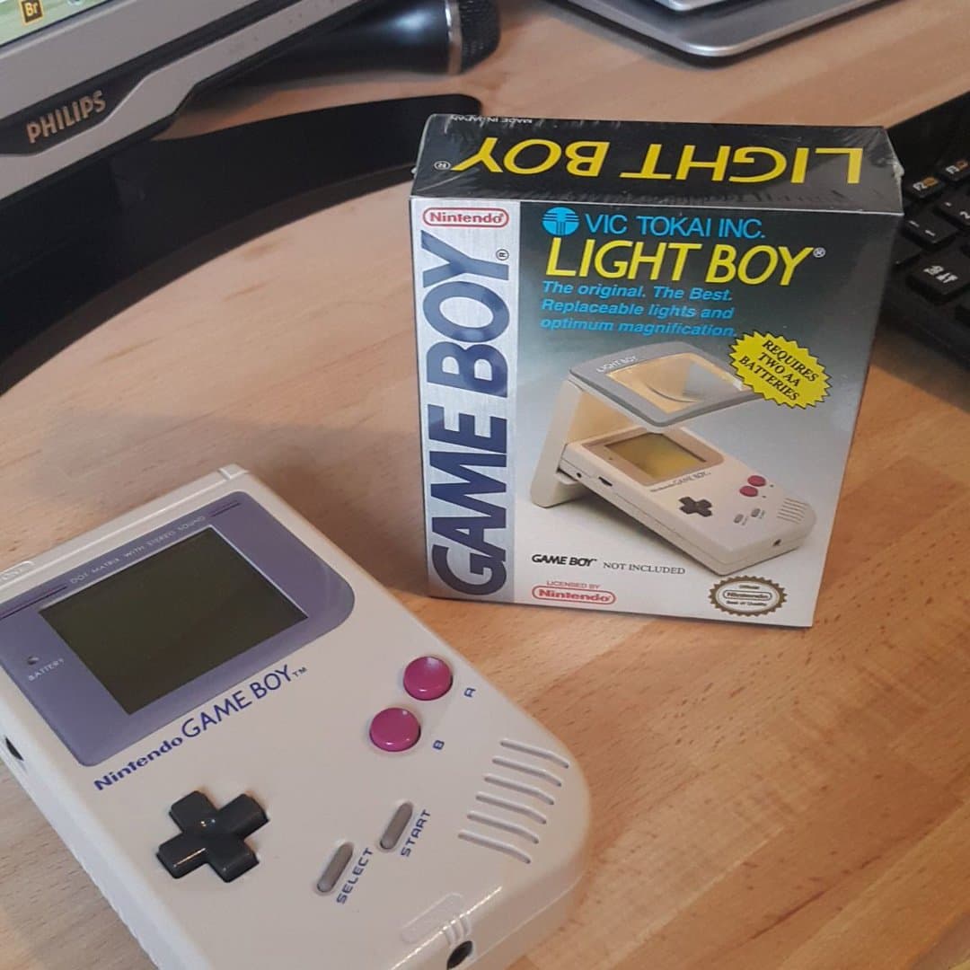 Classic Nintendo Game Boy with a Vic Tokai Light Boy screen magnifier and light accessory. - Photo 1
