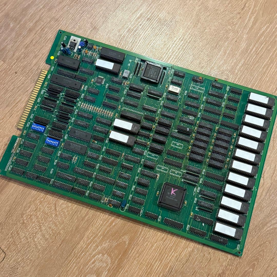 Kombat Rev. 2 bootleg arcade game PCB, likely for Mortal Kombat, with various ICs and switches. - Photo 1