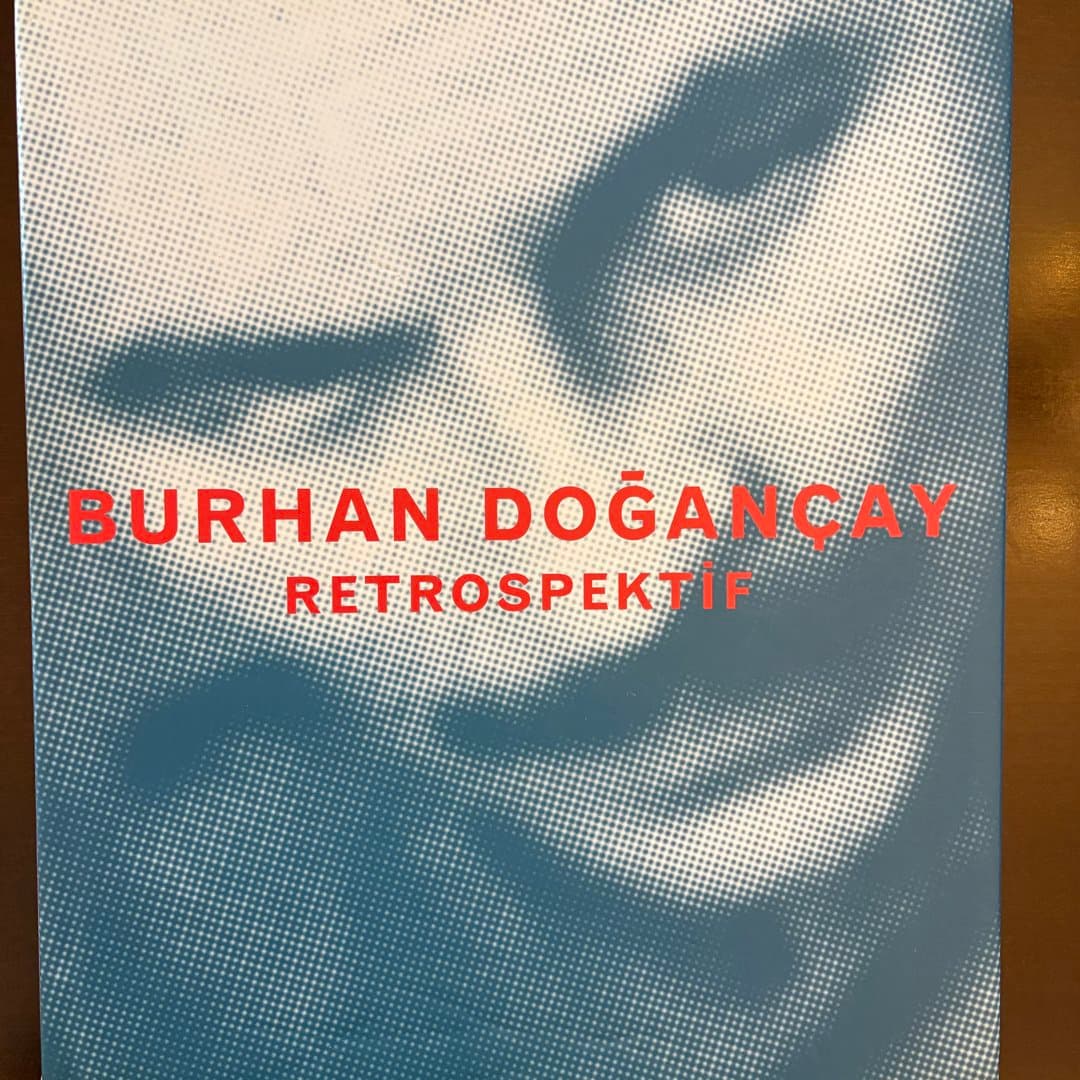 Retrospective art book on Burhan Doğançay, featuring a halftone portrait cover. Mi - Photo 1
