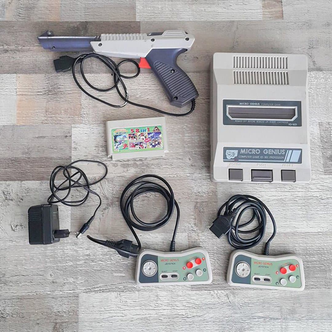 Micro Genius IQ-501 vintage video game console with light gun, controllers, and 58-in-1 cartridge. - Photo 1