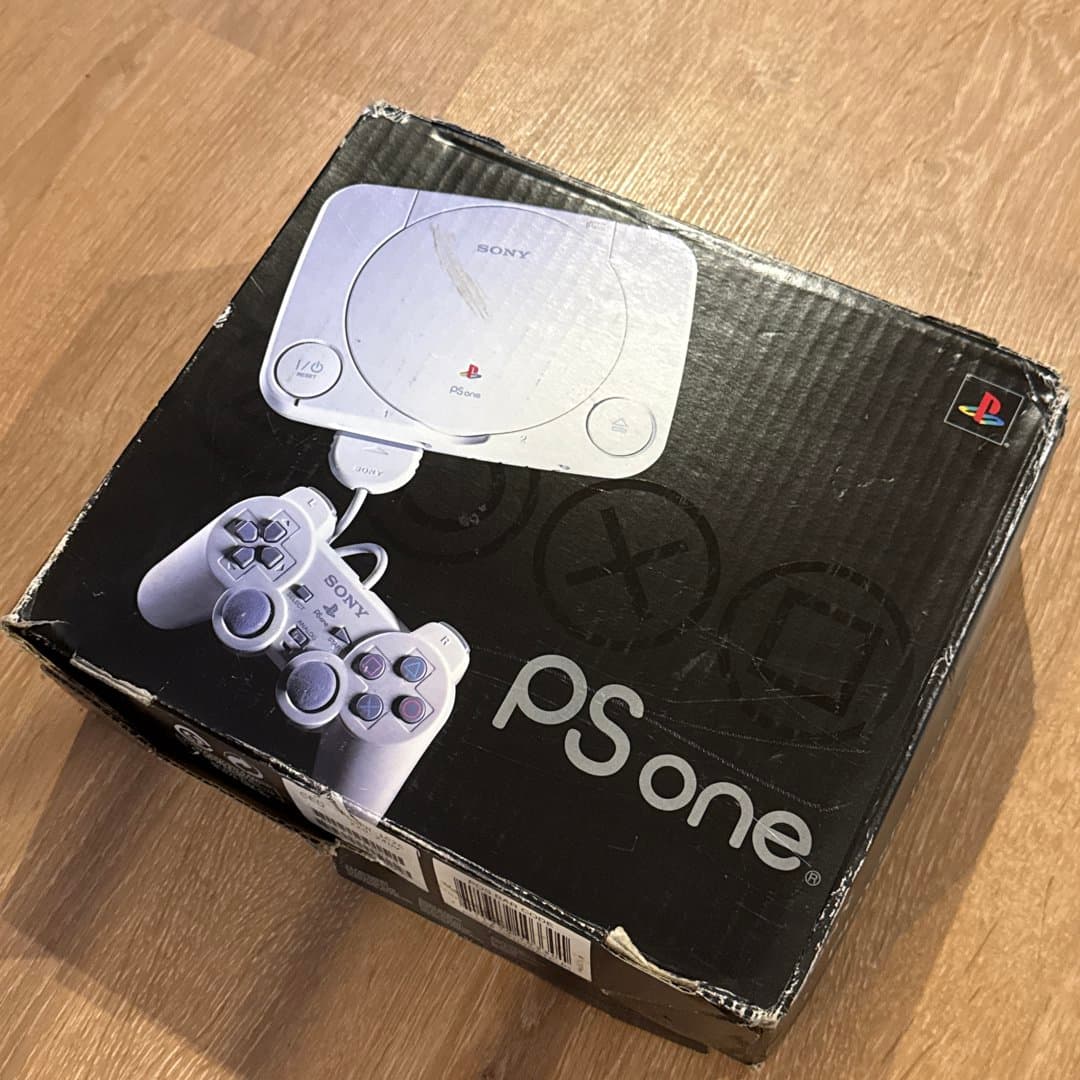 Sony PSone console box with controller, a classic retro gaming system.