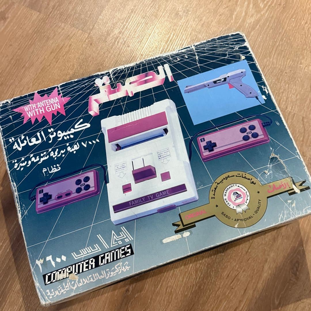 Vintage Famiclone console box with light gun and controllers, labeled "Family TV Game". - Photo 1