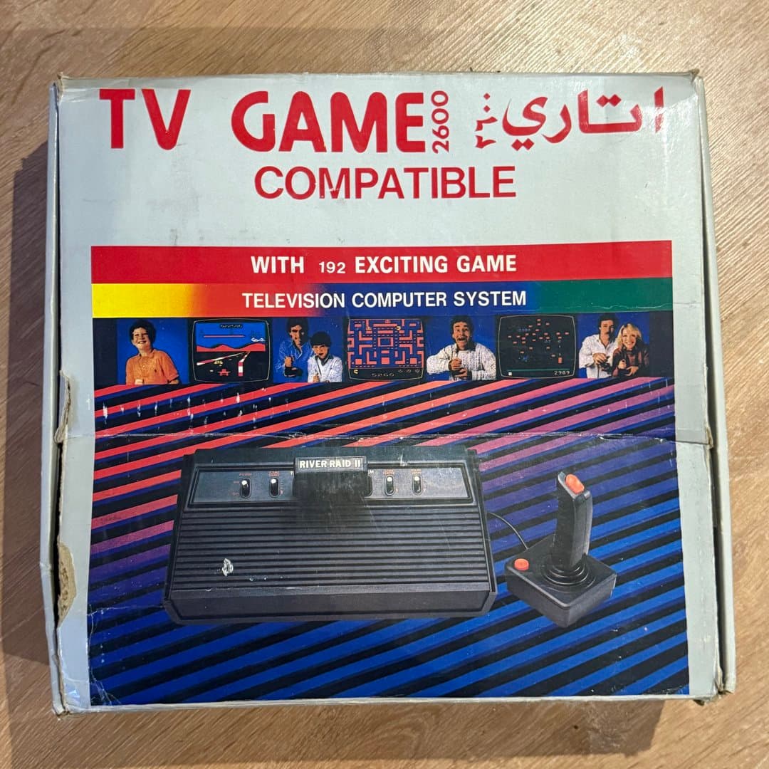 Retro TV game console compatible with Atari 2600, featuring 192 built-in games. - Photo 1