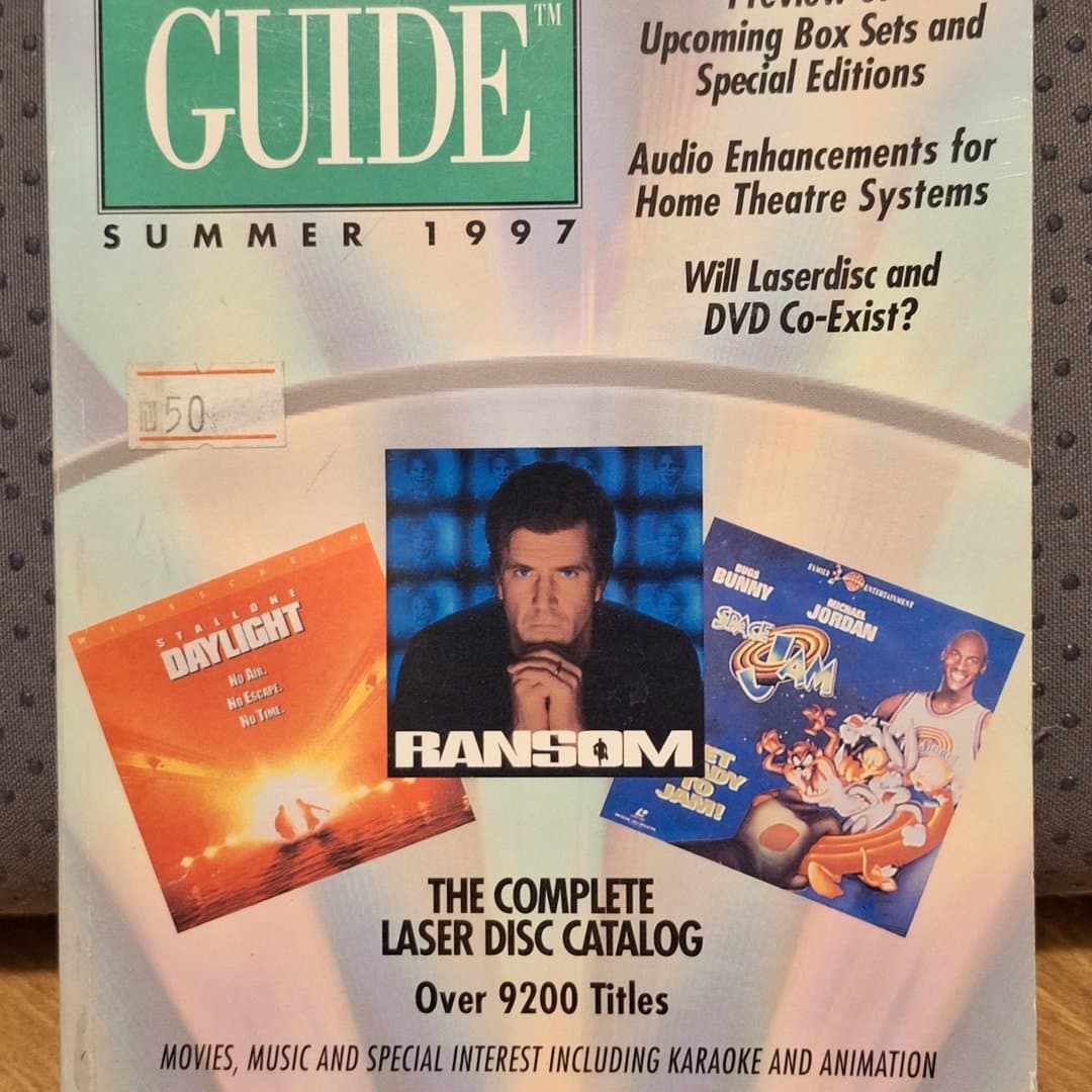 1997 Laser Video Guide catalog with over 9200 LaserDisc titles and a premier DVD guide.